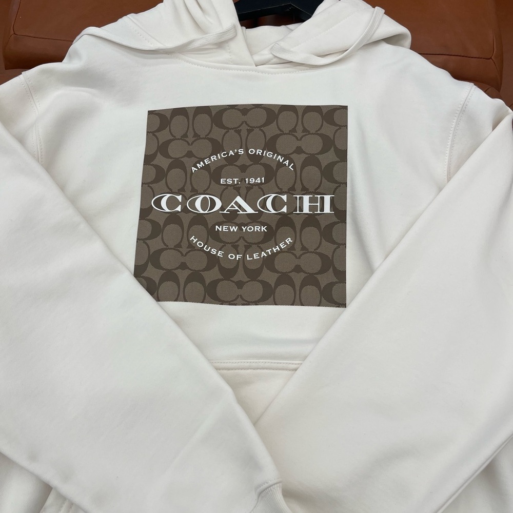 Coach Cream Hoodie with Brown Graphic